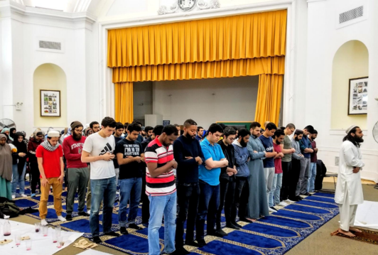 Students praying taraweeh in Earl Hall auditorium. 