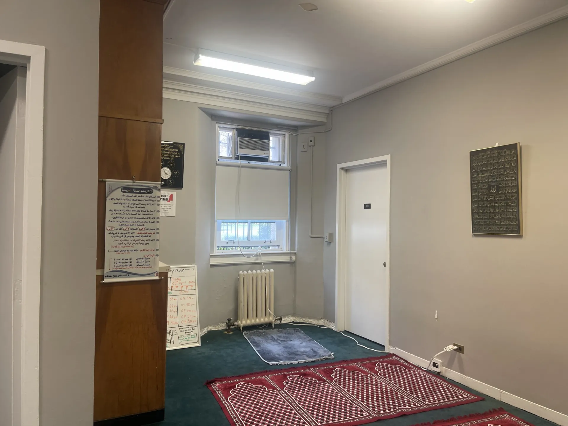 Earl Hall Room 110 Prayer space with prayer rugs laid out