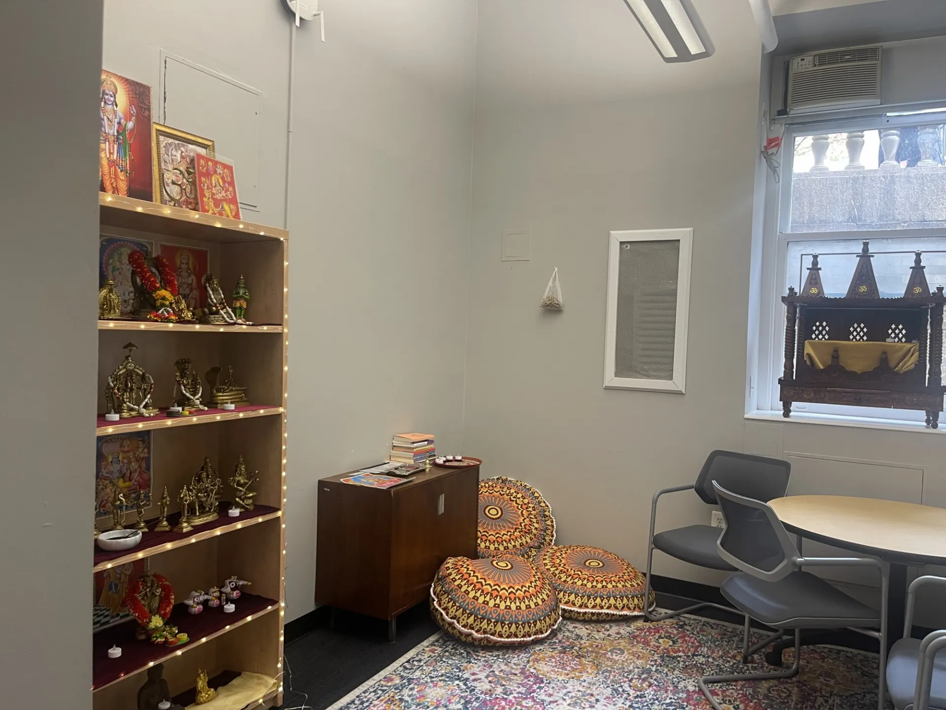 Meditation room "the study" in St. Paul's Chapel with meditation cushions and Hindu iconography. 