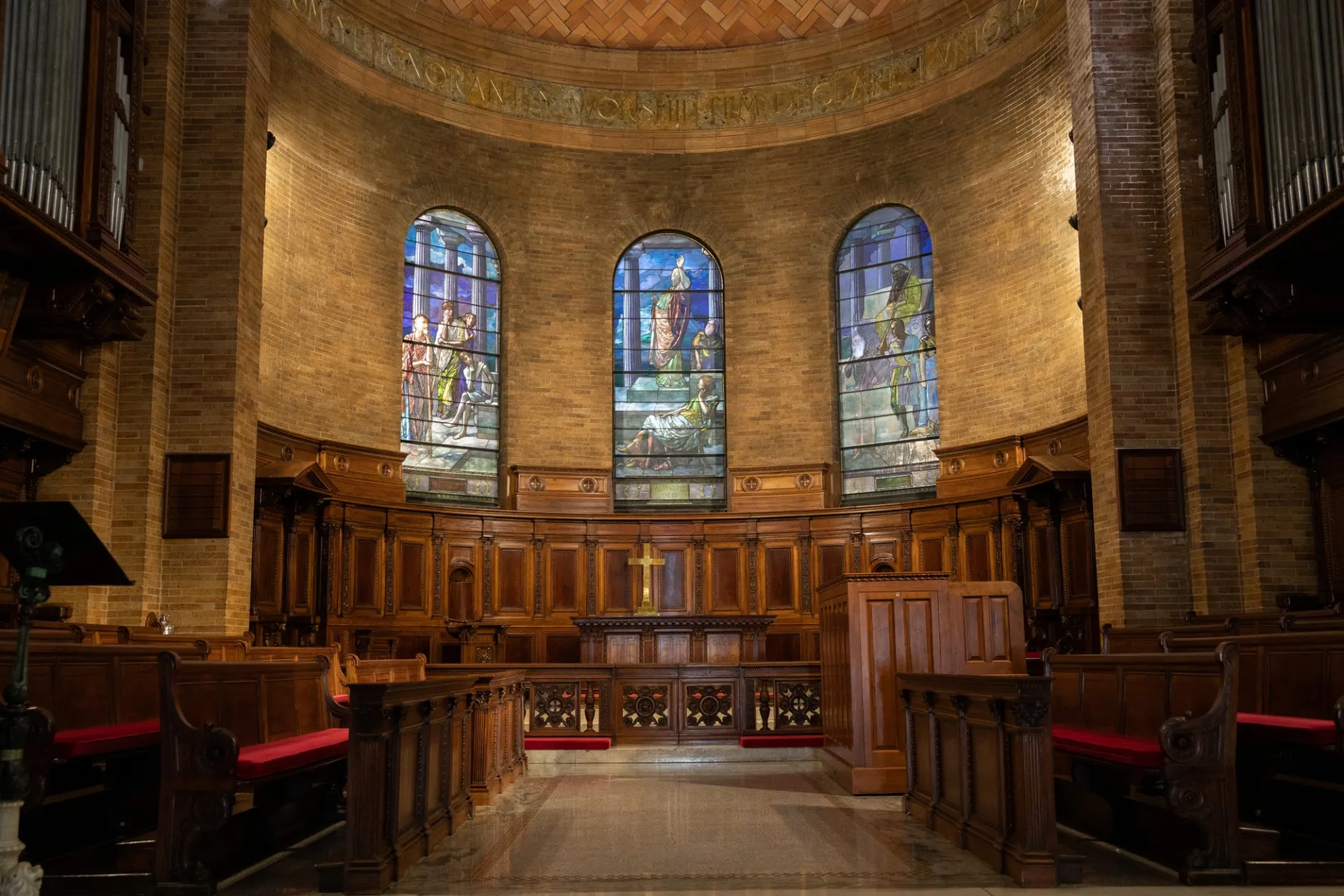 Picture of the three stained glass windows in St. Paul's Chapel sacred space. 