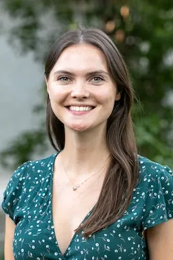 Photo of Tessa McGowan in a green floral dress 